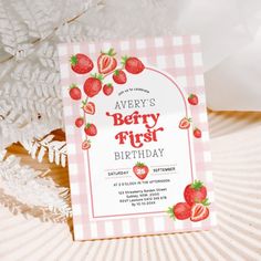 a pink and white birthday card with strawberries on it