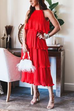 The Bella tiered dress is now back in a bright bold red! Style this beautiful maxi with the pearl belt. Fully Lined High Neck Midi Tired style midi can be styled with belt Pleated tiered Midi Elastic waist band Tie back closure Model is wearing a size Small. She is 5'6". 130lbs. Bust: 34C" Waist 26" Hips 36" Red Ruffle Dress, Shall We Dance, Tie Backs, Tiered Dress, Pet Hair, Ruffle Dress, Elastic Waist, High Neck, Red Dress