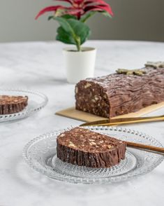 there are two slices of chocolate cake on the plate