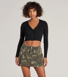 Adventure awaits in this camo mini skirt boasting a flattering mid-rise waist and trendy cargo pockets that give your outfit an edgy allure. Pair with a crop top.Fit & FeaturesCamo-printed cotton-blend denim fabricMid-rise waist with belt loopsSingle button with hidden zipper closurePleatedCargo flap pocketsMini length hemRuns true to size Orange Homecoming Dresses, Purple Homecoming Dress, Camo Mini Skirt, Backless Dress Short, Cargo Mini Skirt, Green Homecoming Dresses, Homecoming Outfits, White Homecoming Dresses, Lace Dress Styles