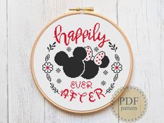 a cross - stitch pattern with the words happily ever and mickey mouse on it's face