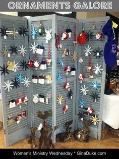 a room divider with ornaments hanging on it and the words women's christmas ornaments galore