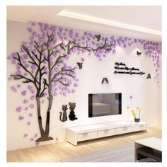 a living room with white walls and purple trees on the wall