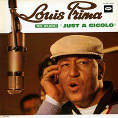 an old man talking on a cell phone next to a microphone with the words louis prima just a giolo anthologie