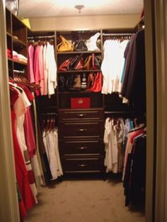 the closet is full of clothes and shoes