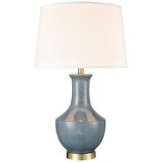 a blue lamp with a white shade on it