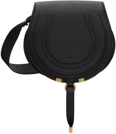 LWG-certified grained calfskin shoulder bag in black. · Adjustable and detachable crossbody strap · Logo embossed at face · Concealed patch pocket at face · Tab-slot flap · Card slot at interior · Cotton twill lining · Antiqued gold-tone hardware · H8 x W9.5 x D3.25 Supplier color: Black Chloe Marcie, Saddle Bag, Black Media, Crossbody Strap, Saddle Bags, Antique Gold, Cotton Twill, Patch Pocket, Saddle