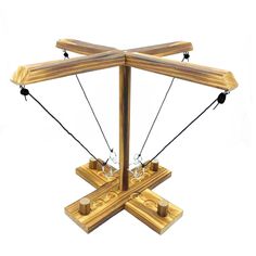 a wooden balance beam with three ropes attached to each other, and two pieces of wood in the middle