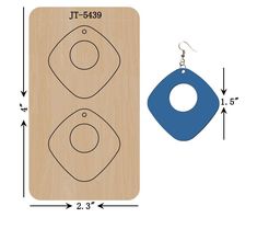 a pair of wooden earrings is shown with measurements