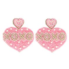 the pink heart shaped earrings are adorned with crystal stones and beaded hearts, which spell love