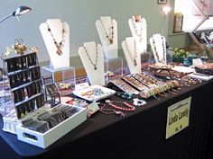 a table with jewelry on it at an event