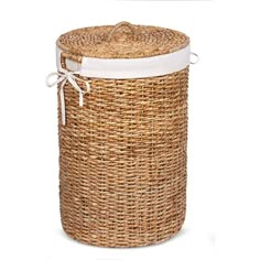 an empty wicker basket is shown with white trimmings on the top and bottom