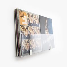 an album is hanging on the wall