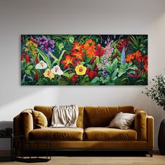 a living room with a brown couch and painting on the wall above it that has colorful flowers