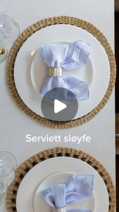 two plates with napkins on them sitting next to each other and the same place setting