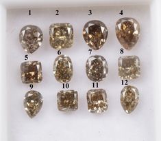 the different types of diamonds are shown in this box with numbers on each one side