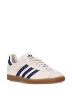 Find ADIDAS Gazelle Sneakers on Editorialist. white/navy blue panelled design front lace-up fastening contrasting branded heel counter signature 3-Stripes logo logo patch to the side logo-embossed tongue round toe branded insole flat rubber sole Shoes For Going Out, Adidas Gazelle Navy, Shoes With Outfits, European Sneakers, Adidas Gazelles, Gazelle Adidas, Navy Blue Adidas, Gazelle Shoes, Samba Shoes