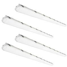 four white plastic toothbrushes on a white background