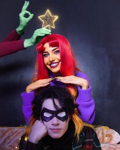 two people dressed up as characters from the little mermaid and maleficent pose for a photo