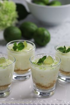 lime posset parfaits with cucumbers and mints in the background