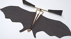 an image of a bat cut out with scissors