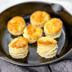 some biscuits are sitting in a pan on the table