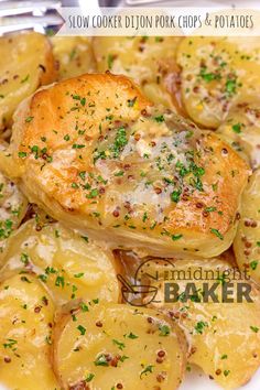 a close up of potatoes with parmesan cheese on top and the words slow cooker onion pork chops & potatoes