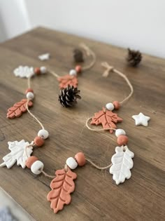 a wooden table topped with different types of decorations on top of it's sides