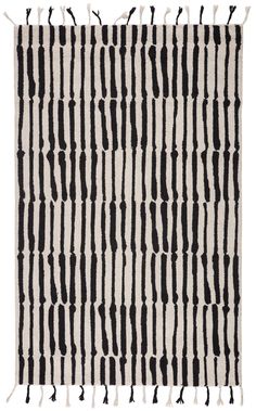 a black and white rug with stripes on it