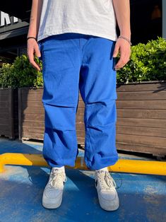 Men's Premium Parachute Utility Unisex Trousers Blue - STREETMODE ™ Blue Baggy Cargo Jeans Casual, Casual Blue Work Pants With Hip Pockets, Stretch Blue Pants With Cargo Pockets, Blue Stretch Pants With Cargo Pockets, Urban Blue Cargo Jeans For Summer, Urban Blue Pants With Pockets, Blue Jeans With Side Pockets For Work, Casual Blue Pants With Side Pockets, Blue Tapered Leg Cargo Pants