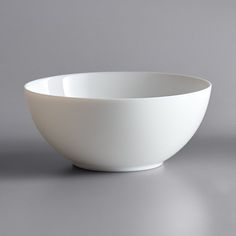 a white bowl sitting on top of a table