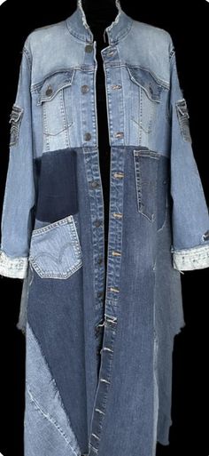 an old jean jacket with patches and laces on the sides, hanging from a black background