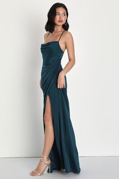 A wow-worthy look like the Lulus Moments of Beauty Dark Teal Satin Cowl Neck Tulip Maxi Dress is ready to make everyone stop and stare! Sleek woven satin shapes this gorgeous dress that features a sleeveless bodice, a cowl neckline, and adjustable spaghetti straps that crisscross at the back. The fitted waist tops a gathered, figure-skimming, tulip-style skirt that finishes at a sophisticated maxi hem. Hidden back zipper/clasp. Fit: This garment fits true to size. Length: Floor length. Size medi Teal Formal Dress Lulus, Dark Teal Satin Dress, Dark Teal Formal Dress, Dark Teal Clothes, Dark Blue Satin Dress, Teal Dress Outfit, Dark Teal Bridesmaid Dresses, Teal Satin Dress, Teal Formal Dress