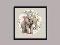 an elephant with flowers and leaves on it's head is shown in a black frame