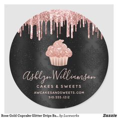 a black and pink cupcake sticker with icing on the bottom that says, asbury williams cakes & sweets