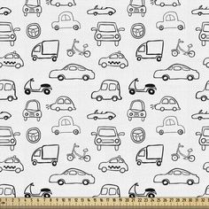 a white fabric with black cars on it