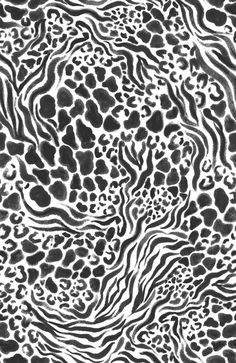 a black and white animal print pattern with spots on the surface, as well as lines