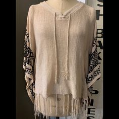 New With Tags Lady’s World Boho Poncho Sweater With Fringe Cream With Dark Blue Pattern One Size Fits Most Smoke Free One Size Casual Long Sleeve Poncho, Casual Long Sleeve Poncho One Size, Casual One Size Long Sleeve Poncho, Casual Long Sleeve Poncho, Cream Casual Poncho, One Size Fits All, Cream Casual Poncho One Size, Casual Cream Poncho, Casual Long Sleeve Cream Poncho, Casual Cream Long Sleeve Poncho