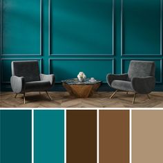 a living room with teal walls and chairs