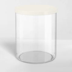 a clear plastic container with a white lid