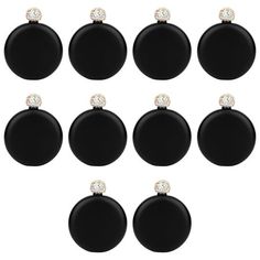 twelve black and white baubles with diamonds on each one, set against a white background