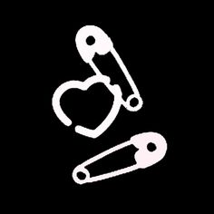 a pair of scissors and a heart on a black background