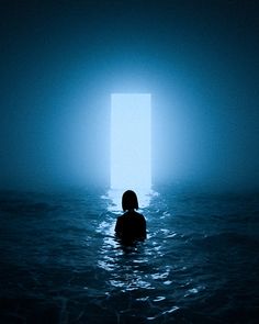 a person in the water with an open door behind them, and light at the end of the tunnel