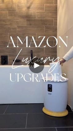 a woman standing next to a bath tub with the words amazon luxury upgrades on it