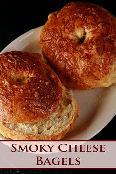 two bagels on a white plate with the words smoky cheese bagels over it