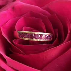 Details: Pretty vintage Mid Century Ruby & 14K yellow gold band, that would look great stacked! The band has 7--2.8mm round deep red Rubies. Please ask all necessary questions prior to placing an order. Measurements: The size is 8 US and can be sized for a fee. Condition: The overall all condition of this ring is very good with subtle wear to be expected from a ring of this age. Ruby Band Ring, Gold Ring Band, Ruby Bands, Platinum Diamond Rings, Gold Engraving, Red Band, Gold Band Ring, Lovely Ring, Yellow Gold Ring