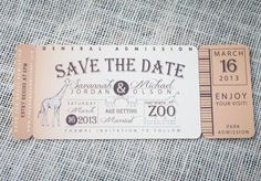 two tickets are sitting next to each other on a piece of cloth with the words save the date printed on it