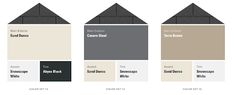 the different paint colors in this house are white, beige, and black with gray roofing shingles