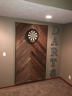 a dart board mounted to the side of a wall