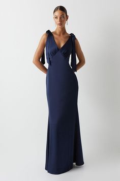 You name the occasion, we have the perfect dress. From maxi to mini and everything in between, find your dream dress to feel confident in. Choose classic shift dresses and flowing floor-length pieces for a timeless style, plus discover on-trend bardot and wrap dresses to wear on repeat. Style: Satin Back Crepe Tie Shoulder Bridesmaids Dress.  Ideal for: Bridesmaids.  Design: Tie.  Model wears size UK 10 and is 5' 9" tall. Italy Wedding Guest Dress, Bridesmaid Dresses Black Tie, Black Tie Party Outfit, Black Tie Attire For Women, Black Tie Dress Code Women, Black Tie Dresses Formal, Black Tie Wedding Guest Dress, Formal Wedding Attire, Long Formal Dresses